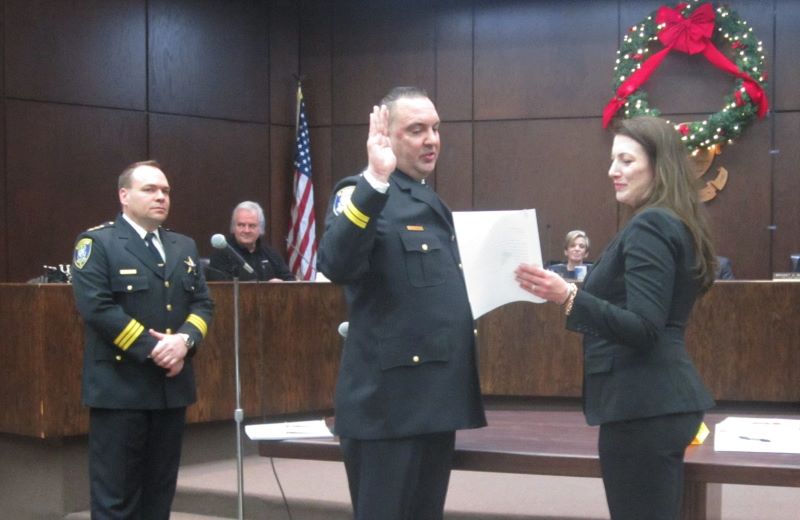 Flossmoor Deputy Chief Clint Wagner is sworn in by Village Clerk Ananda Billings on Monday, Jan. 6. Police Chief Tod Kamleiter promoted Wagner from administrative sergeant last month.