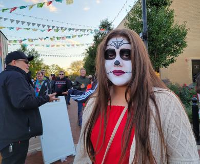 Azalia Fernandez of Homewood wears skull makeup in keeping with the Dia de los Muertos theme of the festival. (EC)