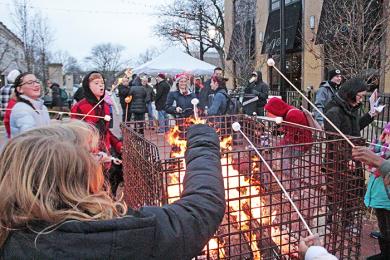Marshmallows get roasted at the 2019 Miracle on Martin event in Homewood. After being canceled in 2020, the festival returns this year on Saturday, Dec. 11. (Chronicle file photo)