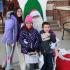 Katelyn, Avery and Connor Cheung of Flossmoor pose for a photo with Santa Claus at the Nov. 27 village holiday event. (EC)