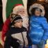 Bennie and Joycelyn Cole of Homewood are the first kids to see Santa Claus at the tree-lighting ceremony in Irwin Park.